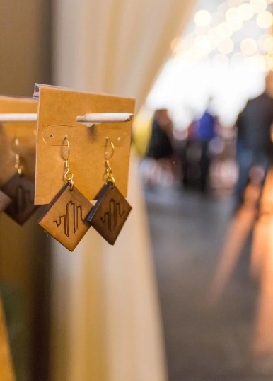 Laser-cut logo earrings