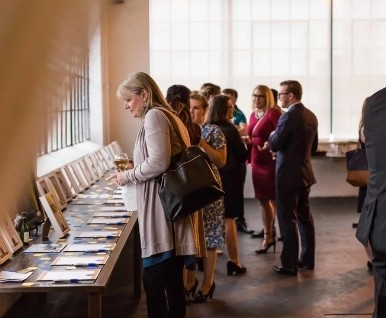 Guests reviewing project displays