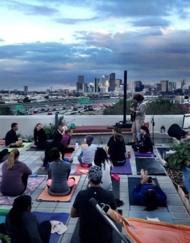 Class with live music and the Denver skyline